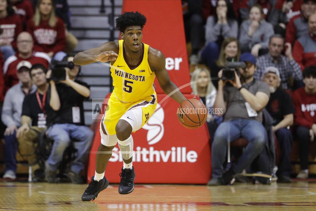 Darron Cummings FILE - Minnesota's Marcus Carr (5) dribbles during the second half of an NCAA college basketball game against Indiana, Wednesday, March 4, 2020, in Bloomington, Ind. The Gophers will again try to bounce back from a bad season after finishing in 12th place in the Big Ten in 2019-20.(AP Photo/Darron Cummings, File)