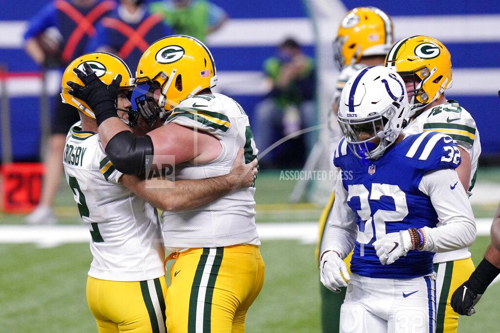 Aj Mast Green Bay Packers kicker Mason Crosby (2) celebrates with Lucas Patrick (62) after Crosby kicked a field goal to tie an NFL football game against the Indianapolis Colts during the second half Sunday, Nov. 22, 2020, in Indianapolis. (AP Photo/AJ Mast)