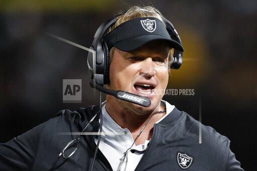 FILE - In this Aug. 10, 2018, file photo, Oakland Raiders coach Jon Gruden reacts during the first half of an NFL preseason football game against the Detroit Lions in Oakland, Calif. Current or former players, along with people in positions of leadership with NFL clubs, have offered differing opinions this week on how pervasive the sorts of racist, homophobic and misogynistic thoughts expressed by Jon Gruden -- in emails he wrote from 2011-18, when he was an ESPN analyst between coaching jobs, to then-Washington club executive Bruce Allen – remain around the sport to this day. (AP Photo/John Hefti, File)