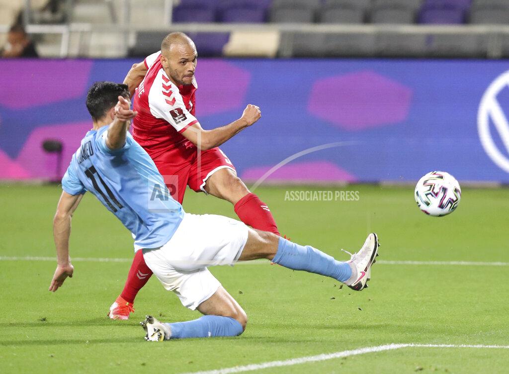Ariel Schalit Denmark's Martin Braithwaite shoots by Israel's Hatem Elhamed during the World Cup 2022 group F qualifying soccer match between Israel and Denmark in Tel Aviv, Israel, Thursday, March 25, 2021. (AP Photo/Ariel Schalit)