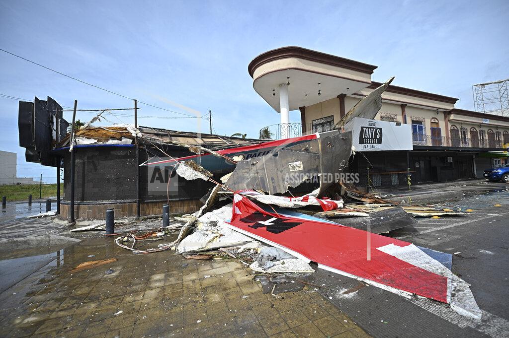 Roberto Echeagaray A bar with a patio lays in ruins after the passing of Hurricane Pamela in Mazatlan, Mexico, Wednesday, Oct. 13, 2021. Hurricane Pamela made landfall on Mexico's Pacific coast just north of Mazatlan on Wednesday, bringing high winds and rain to the port city. (AP Photo/Roberto Echeagaray)
