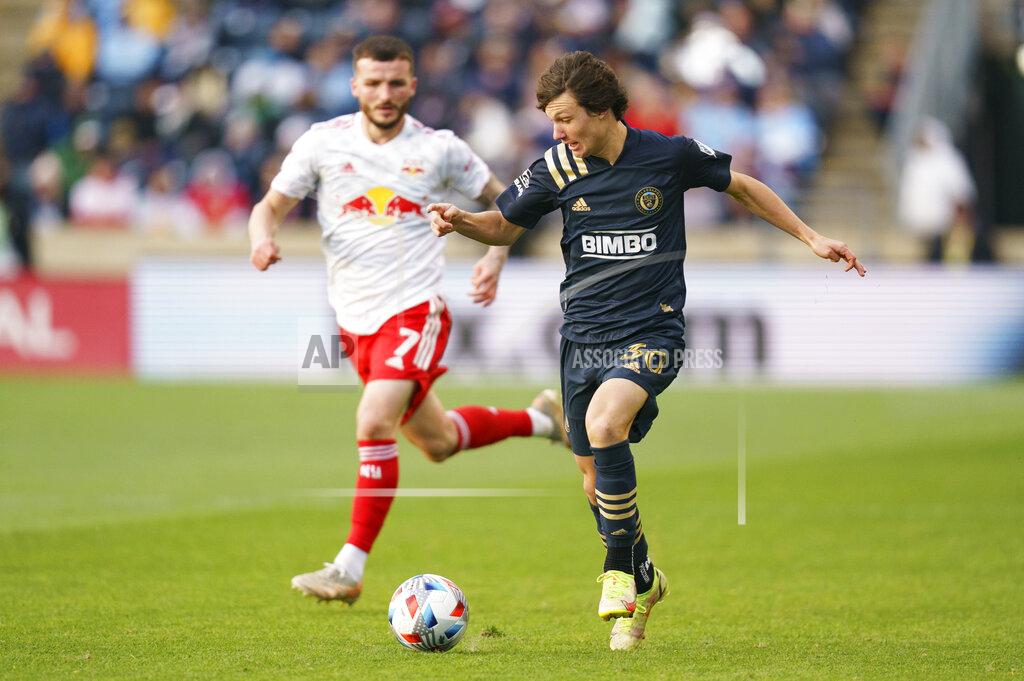 Chris Szagola FILE - Philadelphia Union's Paxten Aaronson, right, in action against New York Red Bulls' Tom Edwards, left, during the second half of an MLS playoff soccer match, Saturday, Nov. 20, 2021, in Chester, Pa. While big brother Brenden Aaronson appears to be headed to the Premier League and possibly the World Cup, Paxten Aaronson is poised to break out on his own. (AP Photo/Chris Szagola, File)