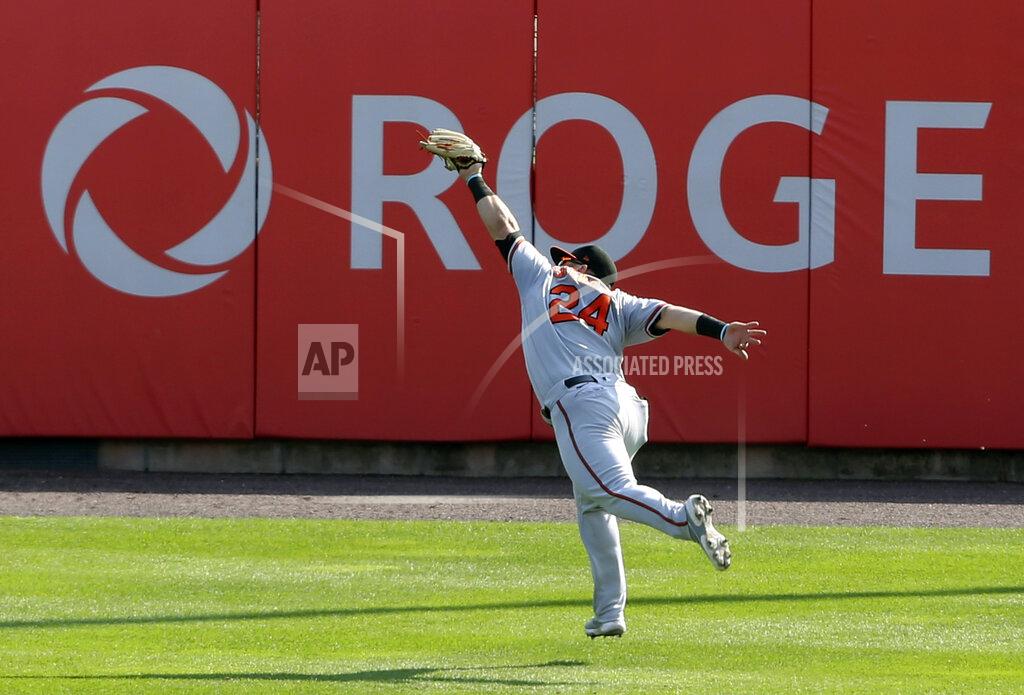 Jeffrey T. Barnes Baltimore Orioles outfielder DJ Stewart makes a leaping catch on Toronto Blue Jays Bo Bichette during the first inning of a baseball game, Sunday, Sept. 27, 2020, in Buffalo, N.Y. (AP Photo/Jeffrey T. Barnes)
