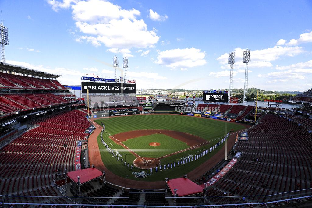 Aaron Doster Members of Detroit Tigers and the Cincinnati Reds take the field to honor Black Lives Matter prior to a baseball game at Great American Ballpark in Cincinnati, Friday, July 24, 2020. (AP Photo/Aaron Doster)