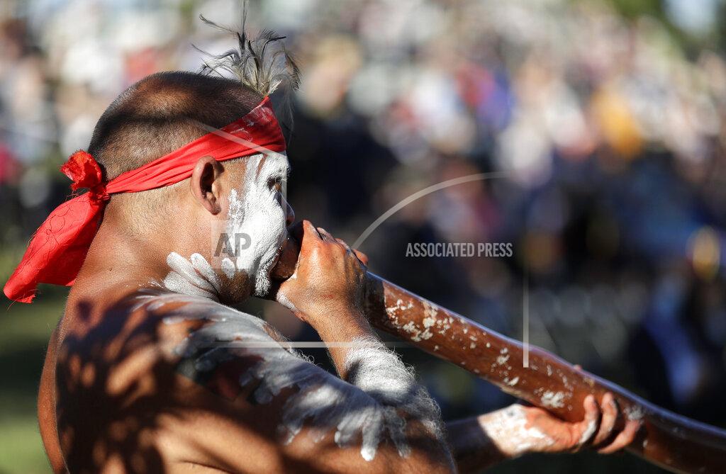 Rick Rycroft Russell Dawson of the Koomurri Aboriginal Dancers participates in a smoking ceremony during Australia Day ceremonies in Sydney, Tuesday, Jan. 26, 2021. (AP Photo/Rick Rycroft)