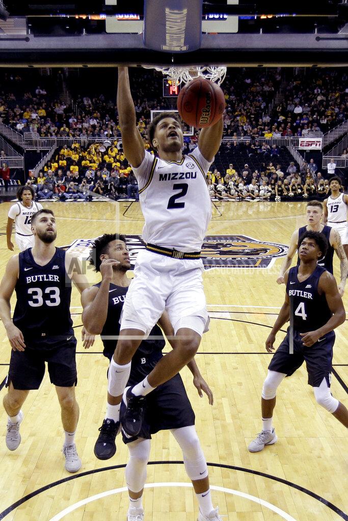 Charlie Riedel Missouri forward Tray Jackson (2) dunks during the first half of an NCAA college basketball game against Butler, Monday, Nov. 25, 2019, in Kansas City, Mo. (AP Photo/Charlie Riedel)