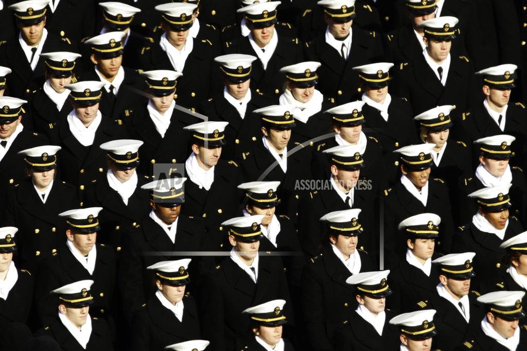Matt Rourke Navy midshipmen march onto the field ahead of an NCAA college football against Army, Saturday, Dec. 8, 2018, in Philadelphia,. (AP Photo/Matt Rourke)