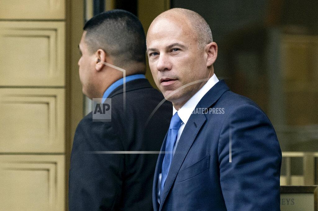 FILE - In this July 23, 2019, file photo, California attorney Michael Avenatti walks from a courthouse in New York, after facing charges. Avenatti, a lawyer who gained fame by representing a porn star in lawsuits against President Donald Trump, has been convicted Friday, Feb. 14, 2020, of trying to extort the apparel company Nike. The charges carry a combined potential penalty of 42 years in prison. (AP Photo/Craig Ruttle, File)