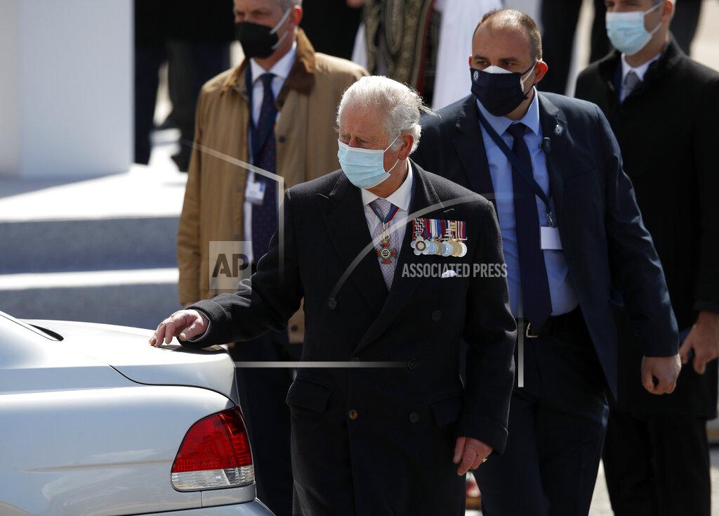 Thanassis Stavrakis Britain's Prince Charles, front, leaves after attending parade in front of the Greek Parliament in Athens, Thursday, March 25, 2021. Greece celebrates the bicentenary of the start of the country's war of independence against the Ottoman Empire. (AP Photo/Thanassis Stavrakis)