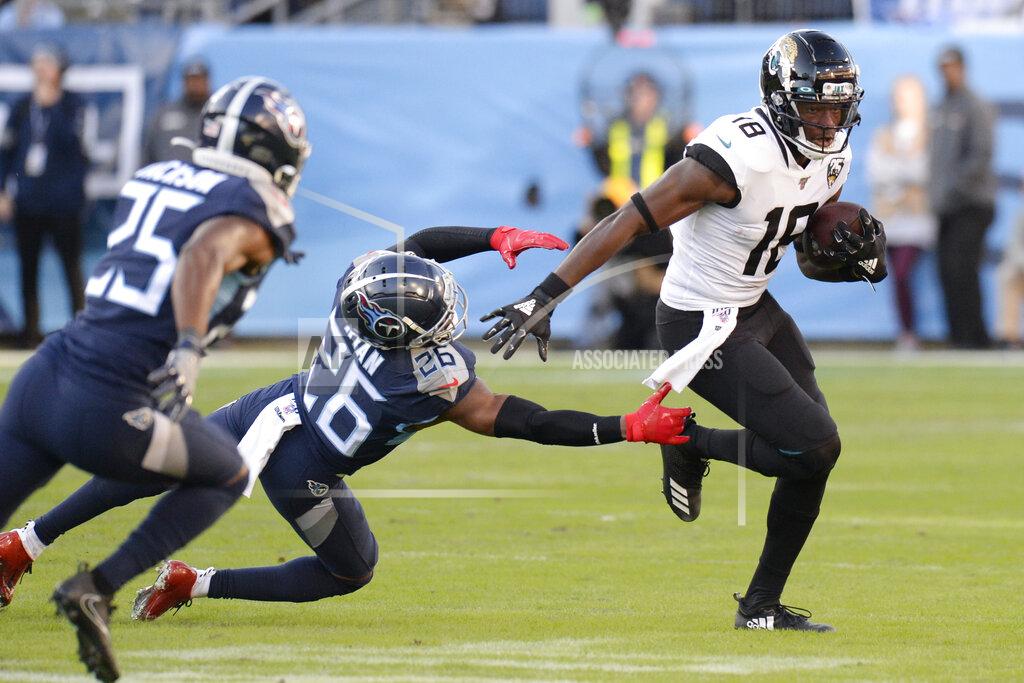 Mark Zaleski Jacksonville Jaguars wide receiver Chris Conley (18) gets past Tennessee Titans cornerback Logan Ryan (26) in the first half of an NFL football game Sunday, Nov. 24, 2019, in Nashville, Tenn. (AP Photo/Mark Zaleski)