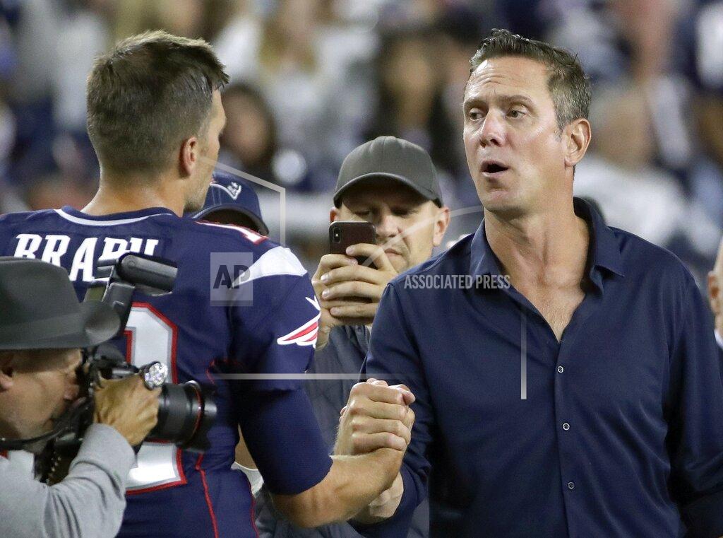 Elise Amendola New England Patriots quarterback Tom Brady, left, greets former Patriots quarterback Drew Bledsoe on the sideline before an NFL football game against the Pittsburgh Steelers, Sunday, Sept. 8, 2019, in Foxborough, Mass. (AP Photo/Elise Amendola)