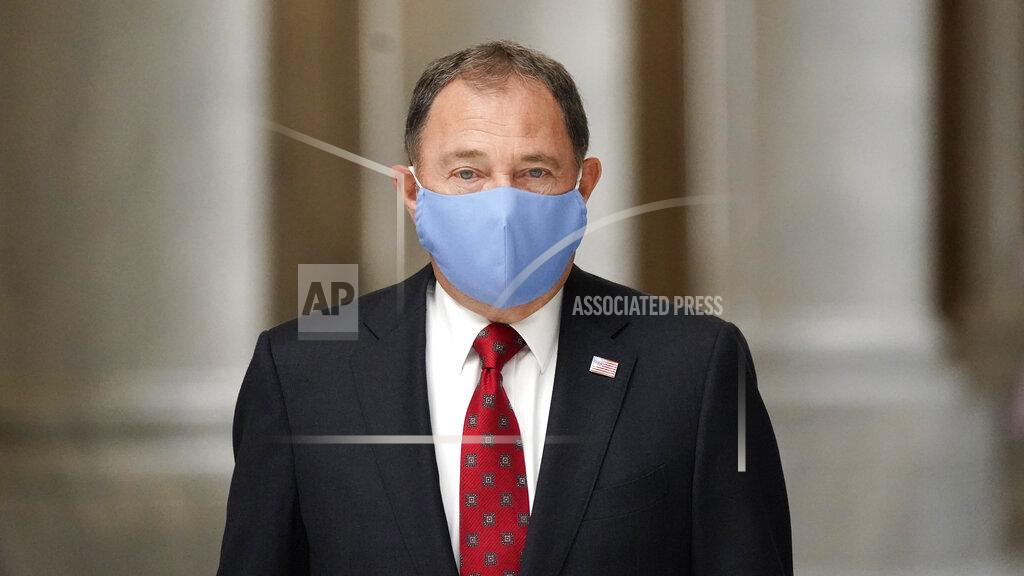 Utah Gov. Gary Herbert walks through the Capitol rotunda to a COVID-19 briefing Tuesday, Sept. 22, 2020, in Salt Lake City. (AP Photo/Rick Bowmer)