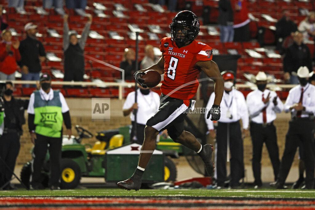 Brad Tollefson Texas Tech's Zech McPhearson (8) scores a touchdown on a fumble recovery during the second half of an NCAA college football game against West Virginia, Saturday, Oct. 24, 2020, in Lubbock, Texas. (AP Photo/Brad Tollefson)