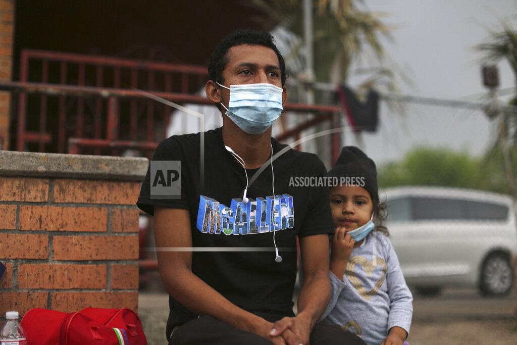 Dario Lopez-Mills FILE - In this Sunday, March 28, 2021, file photo, Carlos Enrique Linga Rivera, 27, and his daughter Betty Noemi, 5, talk to The Associated Press while waiting at Our Lady of Guadalupe Catholic Church in Mission, Texas, on Palm Sunday. U.S. authorities are releasing migrant families at the border without notices to appear in immigration court and sometimes, like in the case of Rivera, without any paperwork at all. (AP Photo/Dario Lopez-Mills, File)