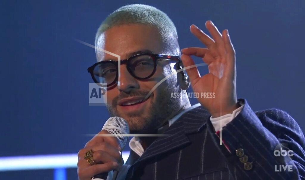 Uncredited In this screen shot provided by ABC on Sunday, Nov. 22, 2020, Mauma performs at the American Music Awards at the Microsoft Theater in Los Angeles. (ABC via AP)