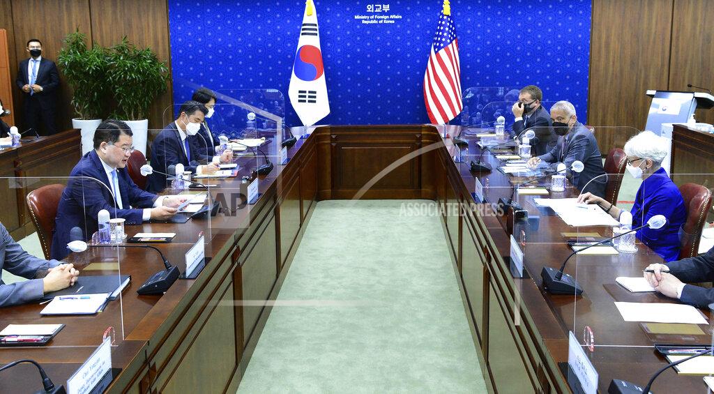 Uncredited In this photo provided by South Korea Foreign Ministry, U.S. Deputy Secretary of State Wendy Sherman, right, holds talks with South Korean First Vice Foreign Minister Choi Jong Kun, left, during their meeting at the Foreign Ministry in Seoul, South Korea, Friday, July 23, 2021. Top U.S. and South Korean officials agreed Thursday to try to convince North Korea to return to talks on its nuclear program, which Pyongyang has insisted it won't do in protest of what it calls U.S. hostility. (South Korea Foreign Ministry via AP)