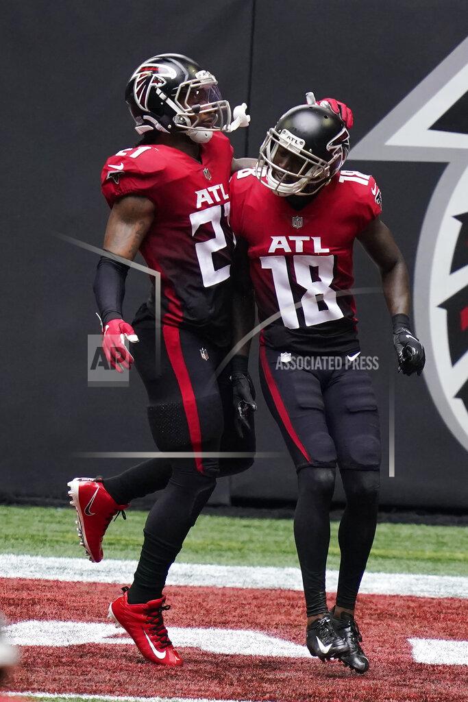 Brynn Anderson Atlanta Falcons running back Todd Gurley (21) celebrates the touchdown of Atlanta Falcons wide receiver Calvin Ridley (18) during the first half of an NFL football game, Sunday, Oct. 25, 2020, in Atlanta. (AP Photo/Brynn Anderson)