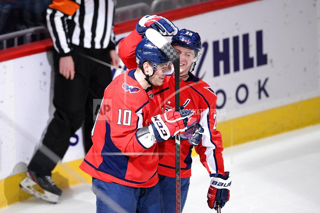 Nick Wass Washington Capitals right wing Daniel Sprong (10) celebrates his goal with center Michael Sgarbossa, back, during the first period of an NHL hockey game against the Boston Bruins, Monday, Feb. 1, 2021, in Washington. (AP Photo/Nick Wass)