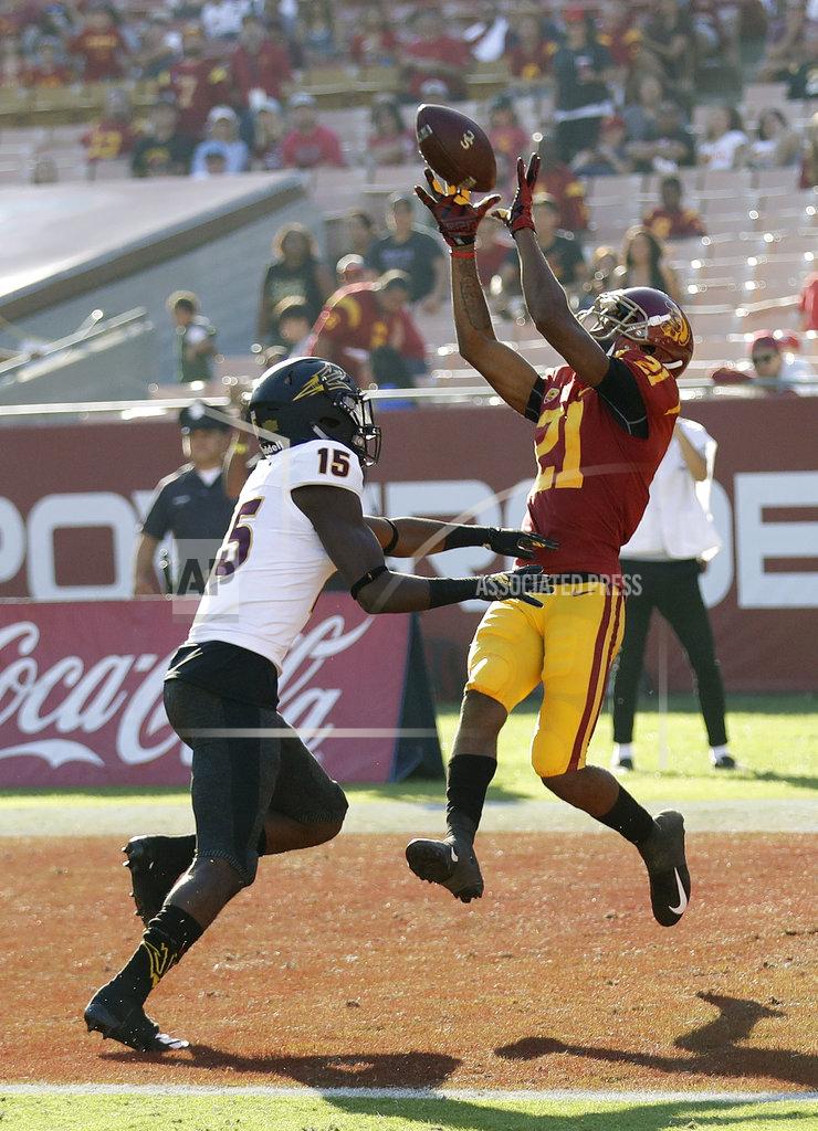 Marcio Jose Sanchez Southern California wide receiver Tyler Vaughns (21) catches a touchdown pass in front of Arizona State safety Cam Phillips (15) during the second half of an NCAA college football game Saturday, Oct. 27, 2018, in Los Angeles. (AP Photo/Marcio Jose Sanchez)