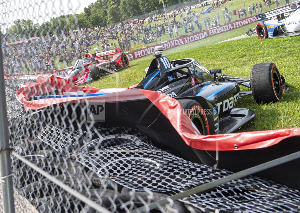 Phil Long Felix Rosenqvist (10), of Sweden, hits the wall near the beginning of an IndyCar Series auto race at Mid-Ohio Sports Car Course, Sunday, Sept. 13, 2020, in Lexington, Ohio. (AP Photo/Phil Long)
