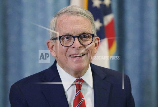 Ohio Gov. Mike DeWine answers reporters questions in Columbus, Ohio, Jan. 6, 2022. Gov. DeWine says he has no regrets about his response to the coronavirus pandemic, even if Republican voters who thought he went too far are angry enough to vote him out in the upcoming May primary. DeWine is running for a second four-year term, which he has said will mark the end of his career in politics. (AP Photo/Paul Vernon, file)