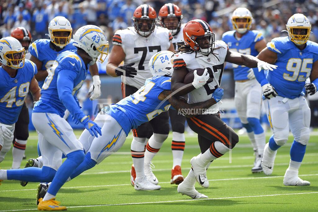Kevork Djansezian Cleveland Browns running back Kareem Hunt, right, is tackled by Los Angeles Chargers safety Nasir Adderley (24) during the first half of an NFL football game Sunday, Oct. 10, 2021, in Inglewood, Calif. (AP Photo/Kevork Djansezian)