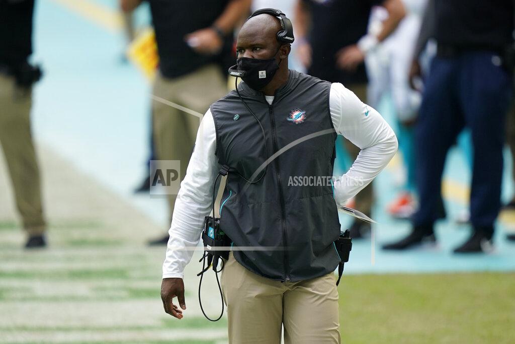 Lynne Sladky Miami Dolphins head coach Brian Flores walks the sidelines during the first half of an NFL football game against the Seattle Seahawks, Sunday, Oct. 4, 2020, in Miami Gardens, Fla. (AP Photo/Lynne Sladky)