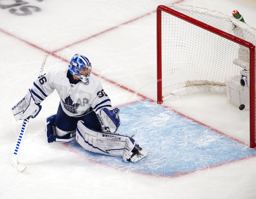 Ryan Remiorz Toronto Maple Leafs goaltender Jack Campbell (36) gives up a goal to Montreal Canadiens' Jesperi Kotkaniemi during overtime in Game 6 of an NHL hockey Stanley Cup first-round playoff seres Saturday, May 29, 2021, in Montreal. (Ryan Remiorz/The Canadian Press via AP)