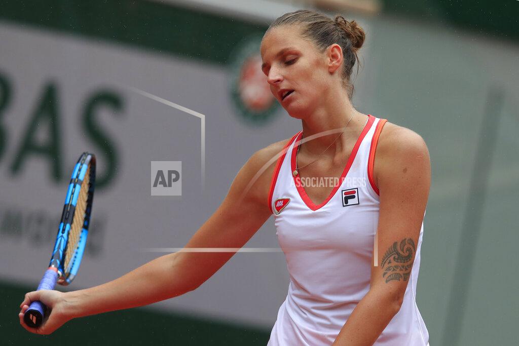 Michel Euler Karolina Pliskova of the Czech Republic reacts after losing a point against Egypt's Mayar Sherif in the first round match of the French Open tennis tournament at the Roland Garros stadium in Paris, France, Tuesday, Sept. 29, 2020. (AP Photo/Michel Euler)