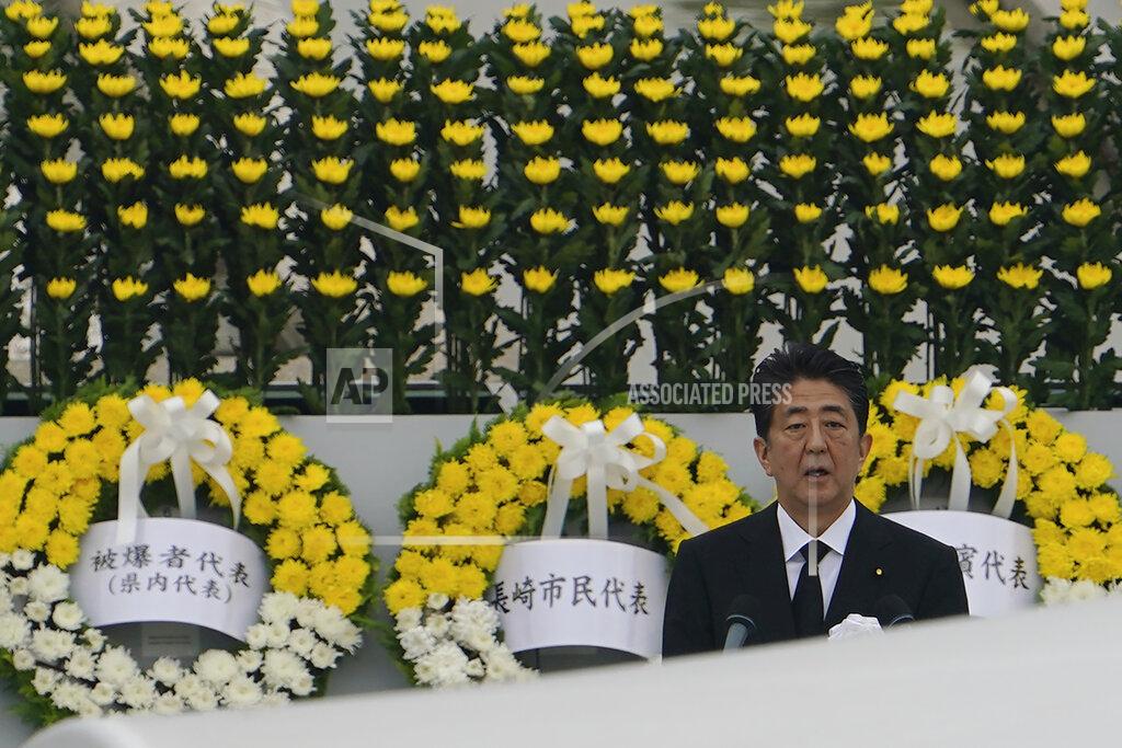 Eugene Hoshiko Japanese Prime Minister Shinzo Abe delivers a speech during a ceremony to mark the 75th anniversary of the bombing at the Hiroshima Peace Memorial Park Thursday, Aug. 6, 2020, in Hiroshima, western Japan. (AP Photo/Eugene Hoshiko)