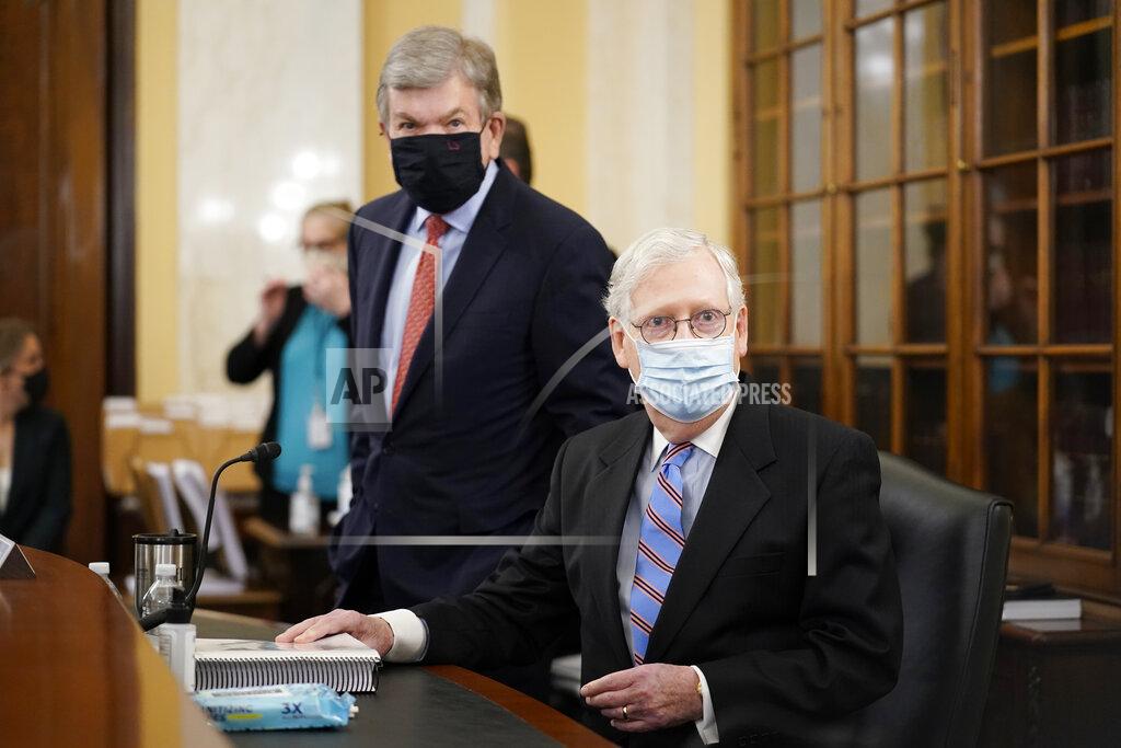 J. Scott Applewhite Senate Minority Leader Mitch McConnell of Ky., right, and Sen. Roy Blunt, R-Mo., arrive for a Senate Rules Committee hearing at the Capitol in Washington, Tuesday, May 11, 2021. (AP Photo/J. Scott Applewhite)
