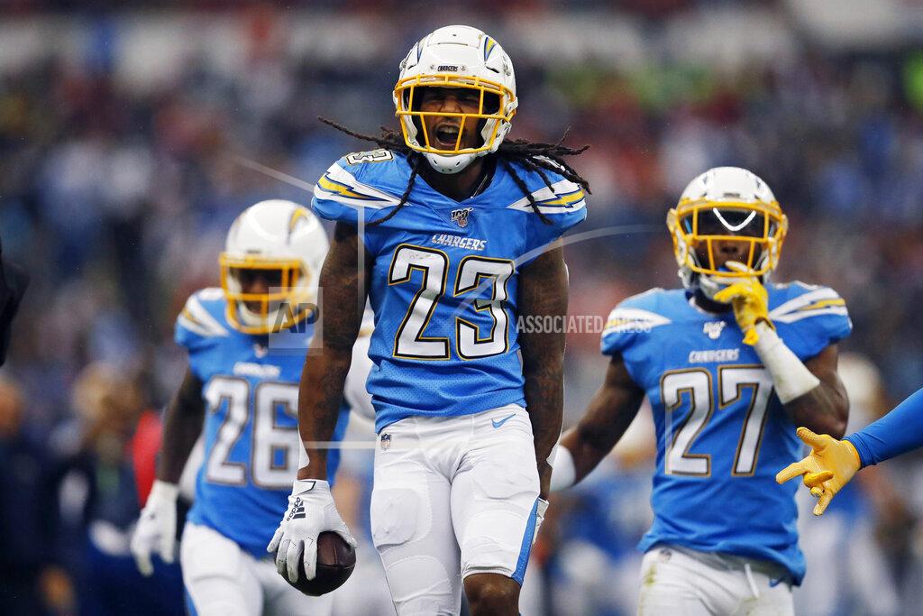 Eduardo Verdugo Los Angeles Chargers strong safety Rayshawn Jenkins, center, celebrates his interception with teammates during the first half of an NFL football game against the Kansas City Chiefs, Monday, Nov. 18, 2019, in Mexico City. (AP Photo/Eduardo Verdugo)