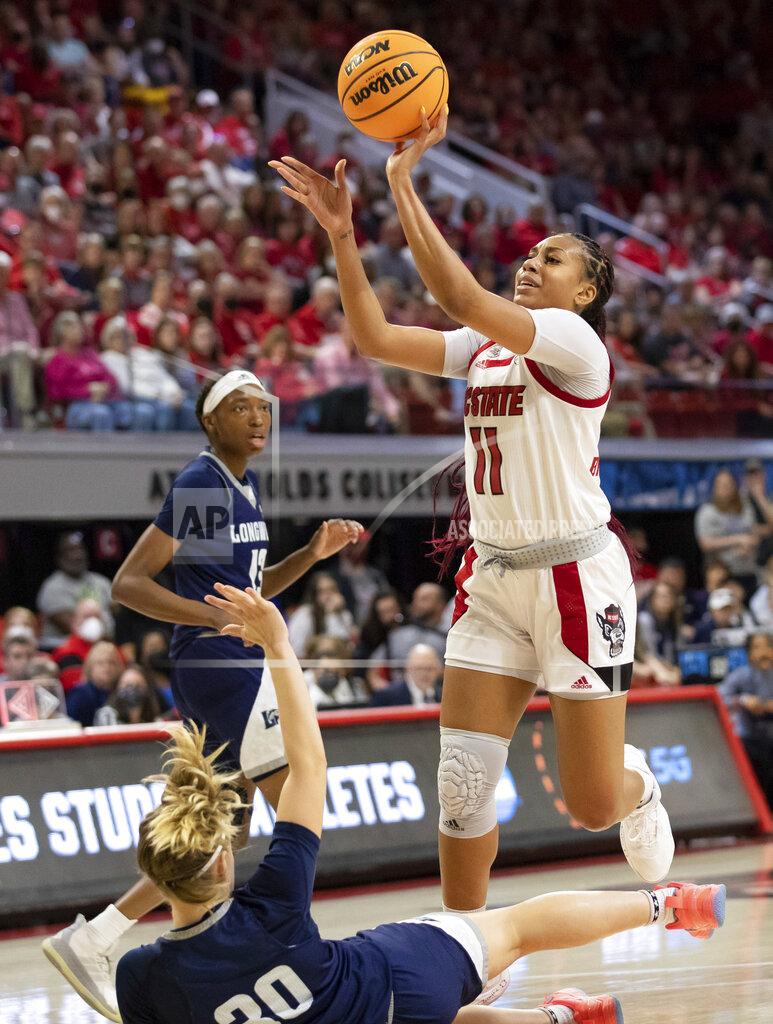 Ben Mckeown North Carolina State's Jakia Brown-Turner (11) attempts a shot over Longwood's Anne-Hamilton (30) during the second half of a college basketball game in the first round of the NCAA tournament in Raleigh, N.C., Saturday, March 19, 2022. (AP Photo/Ben McKeown)