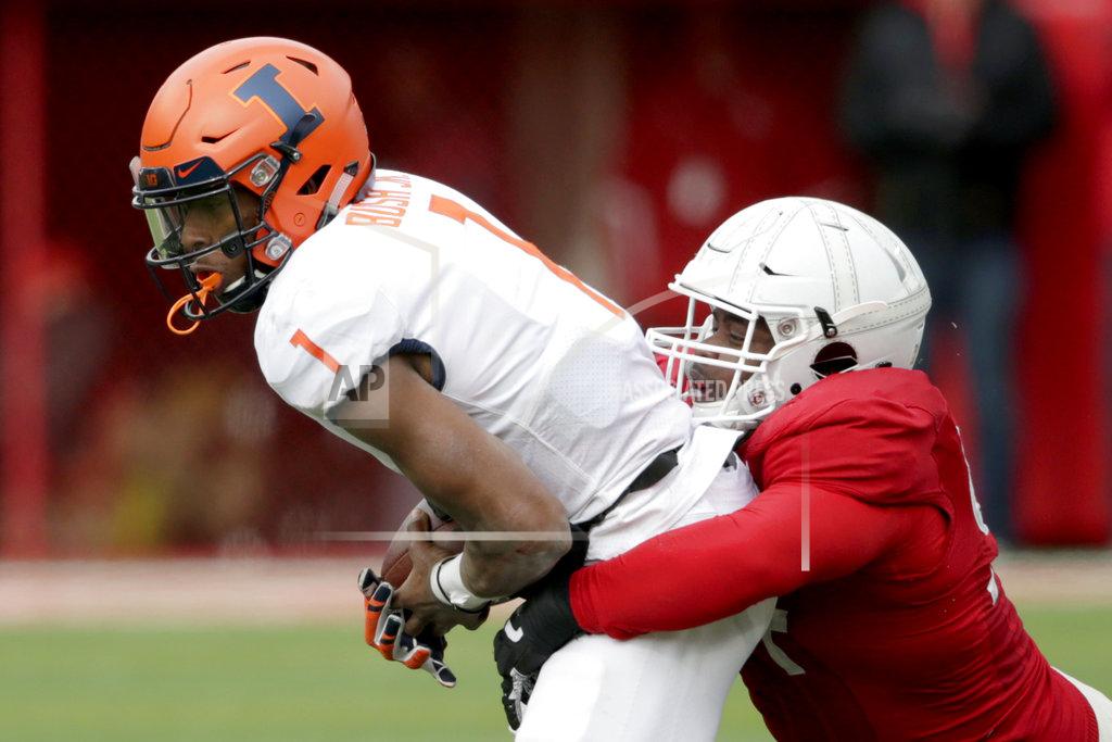 Nati Harnik Nebraska defensive lineman Khalil Davis (94) sacks Illinois quarterback AJ Bush Jr. (1) during the first half of an NCAA college football game in Lincoln, Neb., Saturday, Nov. 10, 2018. (AP Photo/Nati Harnik)