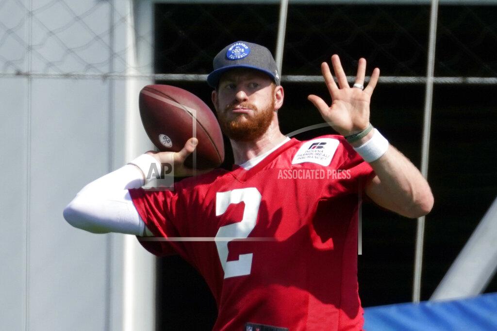 Darron Cummings Indianapolis Colts quarterback Carson Wentz (2) throws during NFL football practice, Thursday, May 20, 2021, in Indianapolis. (AP Photo/Darron Cummings)