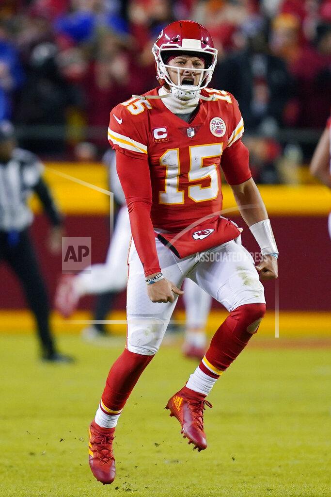 Ed Zurga Kansas City Chiefs quarterback Patrick Mahomes (15) celebrates after throwing a touchdown pass during the first half of an NFL divisional round playoff football game against the Buffalo Bills, Sunday, Jan. 23, 2022, in Kansas City, Mo. (AP Photo/Ed Zurga)