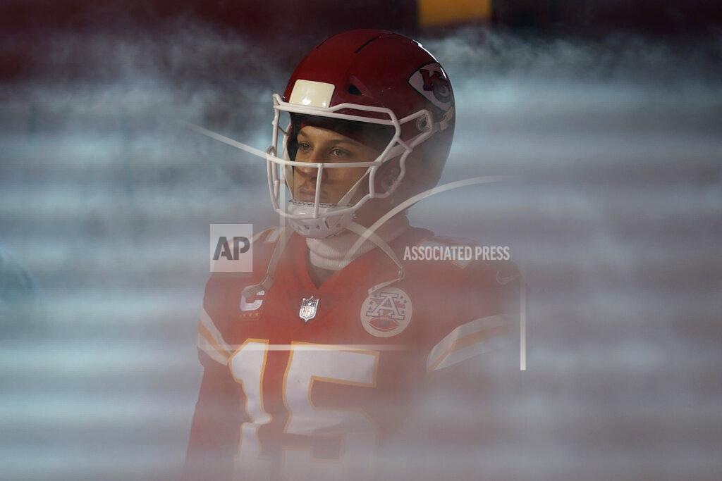 Ed Zurga Kansas City Chiefs quarterback Patrick Mahomes waits to run on the field before an NFL divisional round playoff football game against the Buffalo Bills, Sunday, Jan. 23, 2022, in Kansas City, Mo. (AP Photo/Ed Zurga)