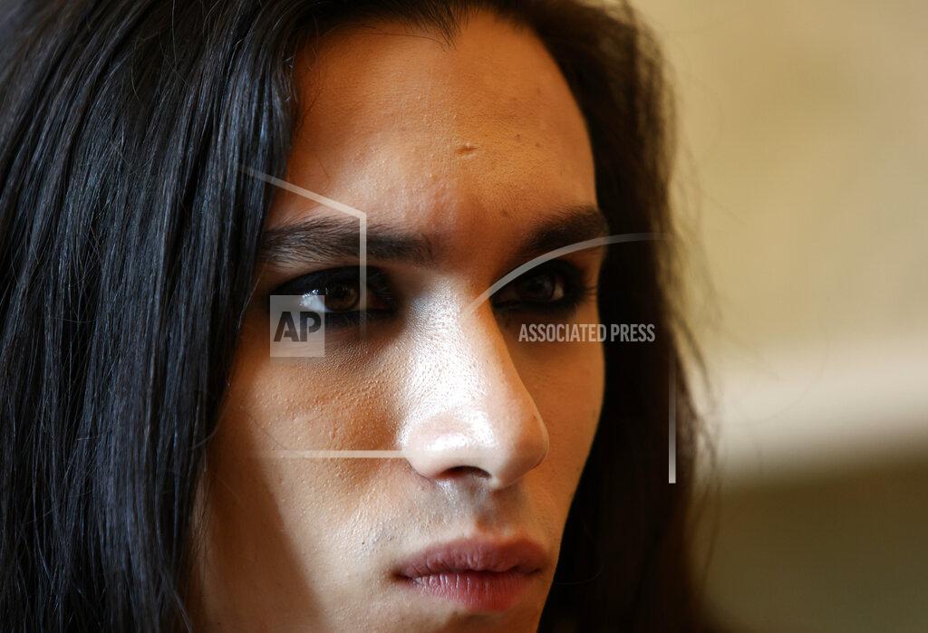 Riccardo De Luca Ethan Torchio, drummer of Italian band Maneskin, winners of the Eurovision Song Contest in May, listens during an interview with the Associated Press at a hotel in Rome, Tuesday, July 27, 2021. (AP Photo/Riccardo De Luca)