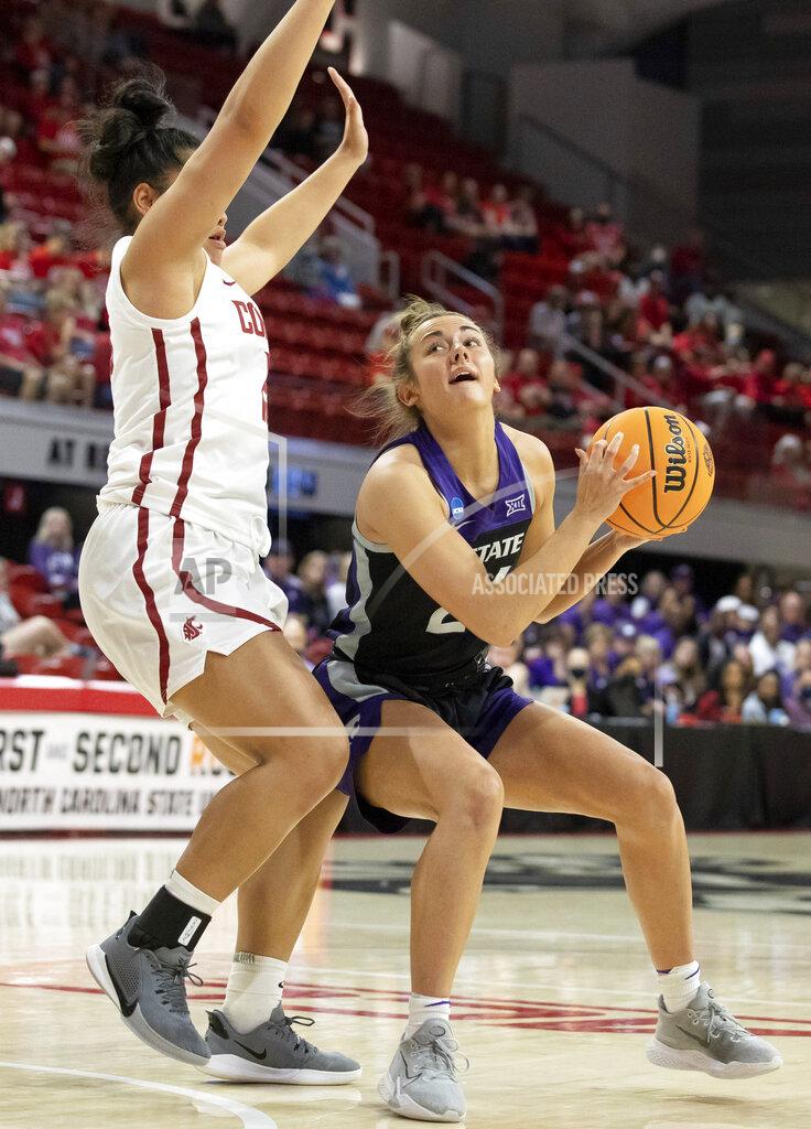 Ben Mckeown Kansas State's Emilee Ebert, right, looks to shoot as Washington State's Ula Motuga, left, defends during the first half of a college basketball game in the first round of the NCAA tournament in Raleigh, N.C., Saturday, March 19, 2022. (AP Photo/Ben McKeown)