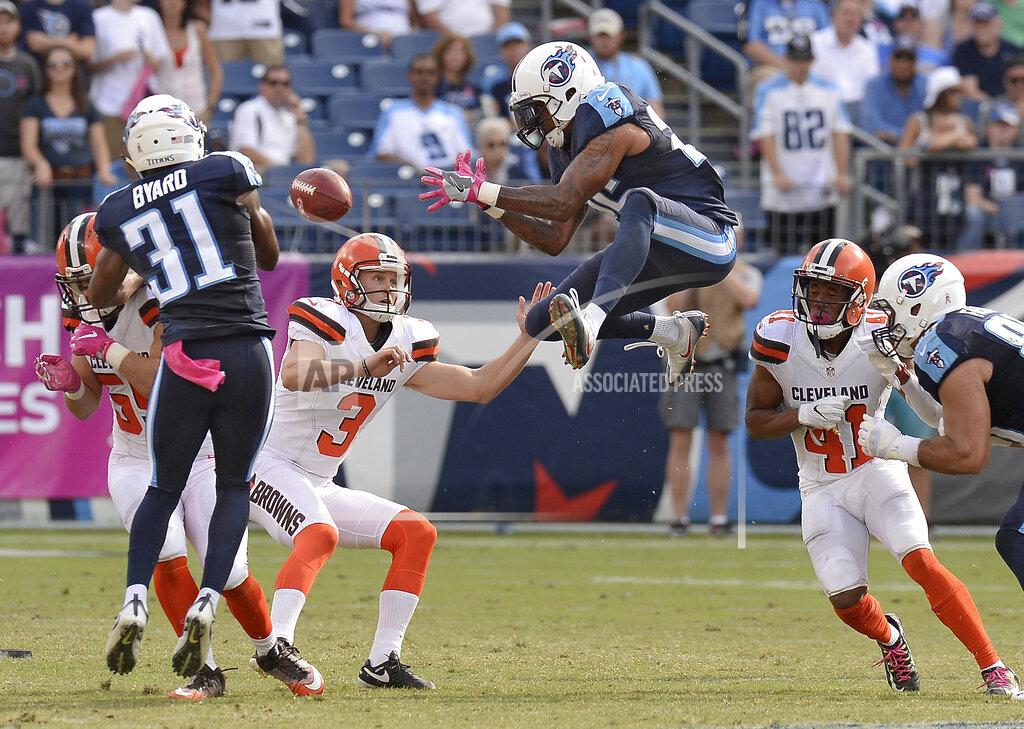 Mark Zaleski FILE - In this Oct. 16, 2016, file photo, Tennessee Titans' Rashad Johnson, center, and Kevin Byard (31) try to control an onside kick by Cleveland Browns' Cody Parkey (3) during the second half of an NFL football game in Nashville, Tenn. The Browns recovered the ball on the play. The NFL desperately is seeking ways to eliminate the more dangerous plays, and the onside kick has been deemed one. It occurs rarely, and in recent years with alterations to alignments and run-ups, the probably of it succeeding has plummeted. So Eagles owner Jeffrey Lurie suggested giving teams an alternative. They could still try the onside kick, or they could opt for a fourth-and-15 play from the kicking team's 25-yard line. (AP Photo/Mark Zaleski, File)