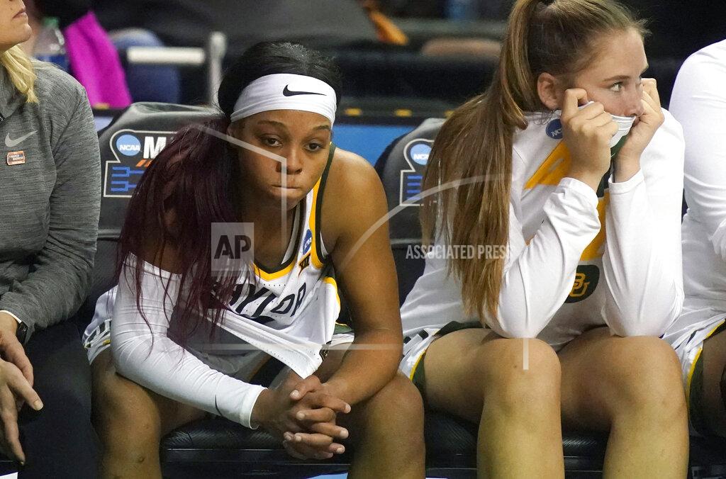 Lm Otero Baylor guard Sarah Andrews, left, sits on the bench with teammate Andrea Katramados in the final minute of the second half of a college basketball game against South Dakota in the second round of the NCAA tournament in Waco, Texas, Sunday, March 20, 2022. (AP Photo/LM Otero)
