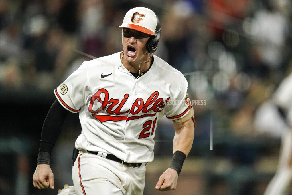Julio Cortez Baltimore Orioles' Austin Hays shouts toward his dugout as he runs after hitting a two-run home run off New York Yankees relief pitcher Chad Green during the eighth inning of a baseball game, Wednesday, Sept. 15, 2021, in Baltimore. (AP Photo/Julio Cortez)