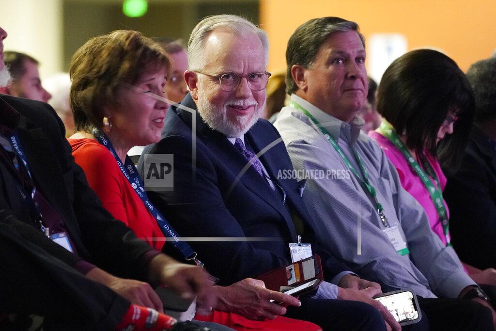 Mark Humphrey Pastor Ed Litton, center, of Saraland, Ala., attends the annual Southern Baptist Convention meeting Tuesday, June 15, 2021, in Nashville, Tenn. (AP Photo/Mark Humphrey)