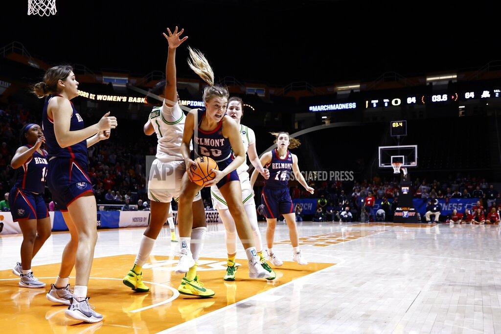 Wade Payne Belmont forward Conley Chinn (20) rebounds the ball in the final seconds during overtime of a college basketball game against Oregon in the first round of the NCAA Tournament, Saturday, March 19, 2022, in Knoxville, Tenn. (AP Photo/Wade Payne)
