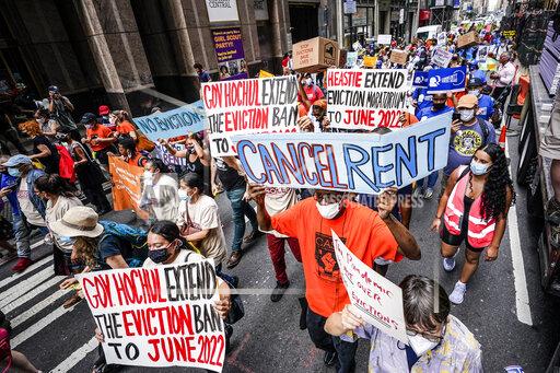 FILE - Housing activists march across town toward New York Gov. Kathy Hochul's office, calling for an extension of pandemic-era eviction protections, Tuesday, Aug. 31, 2021, in New York. Prices paid by U.S. consumers jumped in December 2021 compared to a year earlier, the latest evidence that rising costs for food, gas, rent and other necessities are heightening the financial pressures on America's households. (AP Photo/Mary Altaffer, File)