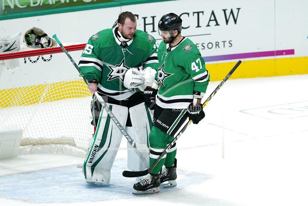 Tony Gutierrez Dallas Stars goaltender Anton Khudobin (35) and right wing Alexander Radulov (47) celebrate after Radulov scored during the second period of the team's NHL hockey game against the Nashville Predators in Dallas, Friday, Jan. 22, 2021. The goal was the second in the night for Radulov. (AP Photo/Tony Gutierrez)