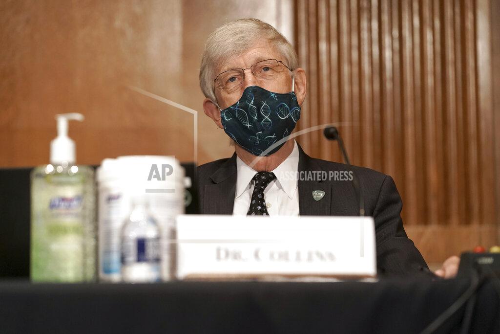 Greg Nash Dr. Francis Collins, Director of the National Institutes of Health, attends a Senate Health, Education, Labor and Pensions Committee hearing to discuss vaccines and protecting public health during the coronavirus pandemic on Capitol Hill, Wednesday, Sept. 9, 2020, in Washington. (Greg Nash/Pool via AP)