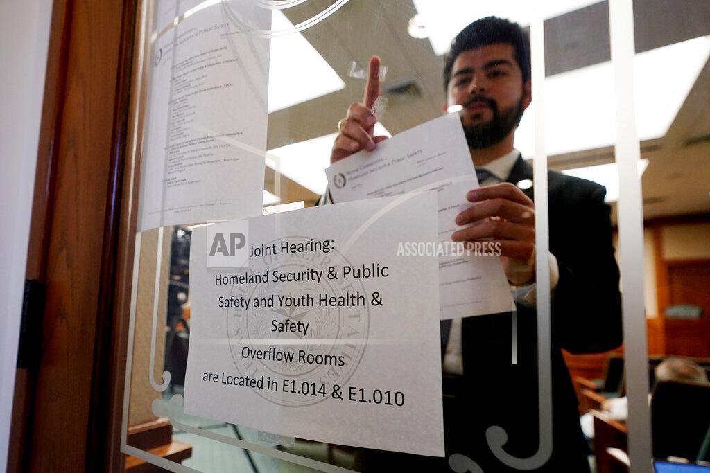 Eric Gay The agenda for a hearing with lawmakers looking at how to prevent mass shootings is posted at the state capitol, Thursday, June 23, 2022, in Austin, Texas. Jazmin Cazares, the sister of a 9-year-old girl killed in the Uvalde school rampage tearfully pleaded with Texas lawmakers to pass gun safety legislation and questioned why so many security measures failed. (AP Photo/Eric Gay)