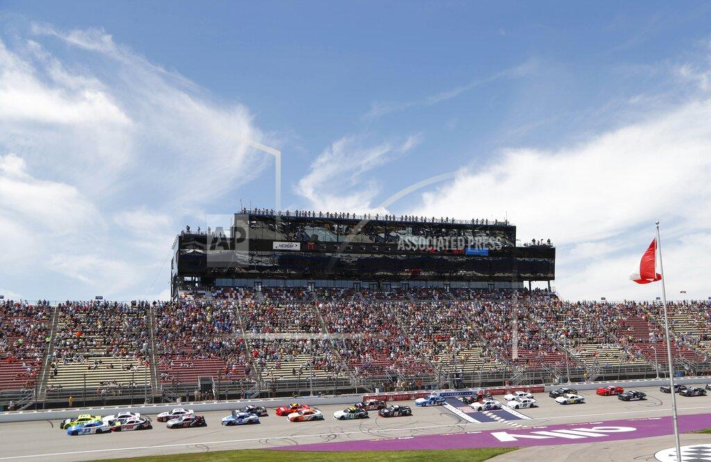 Carlos Osorio Paul Menard (12) leads the field on a restart of the NASCAR Xfinity Series auto race at Michigan International Speedway, Saturday, June 8, 2019, in Brooklyn, Mich. (AP Photo/Carlos Osorio)