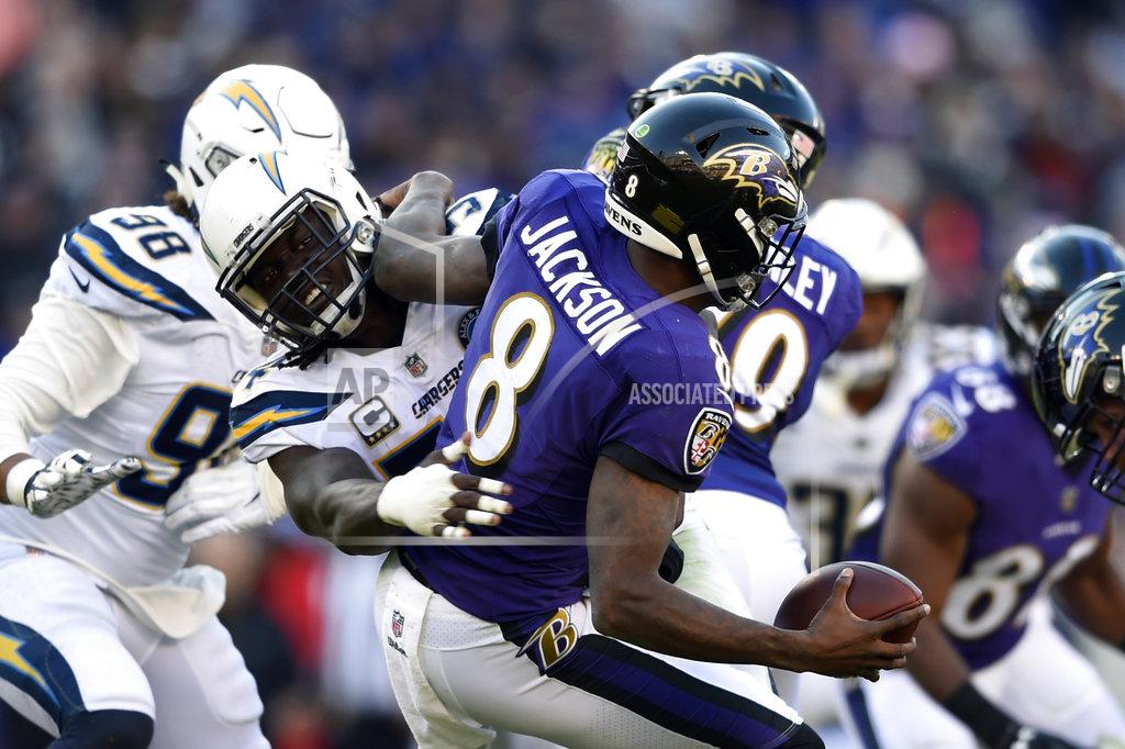 Gail Burton Baltimore Ravens quarterback Lamar Jackson (8) is sacked by Los Angeles Chargers defensive end Melvin Ingram in the second half of an NFL wild card playoff football game, Sunday, Jan. 6, 2019, in Baltimore. (AP Photo/Gail Burton)